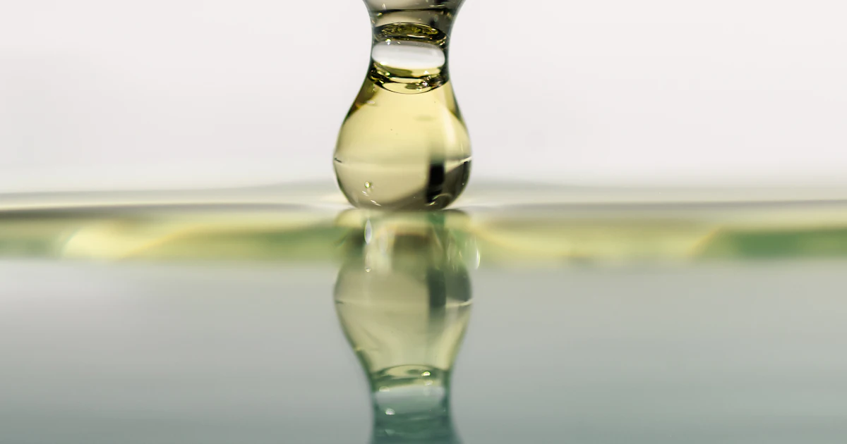 A drop of liquid falling onto a liquid surface A drop of liquid falling onto a liquid surface