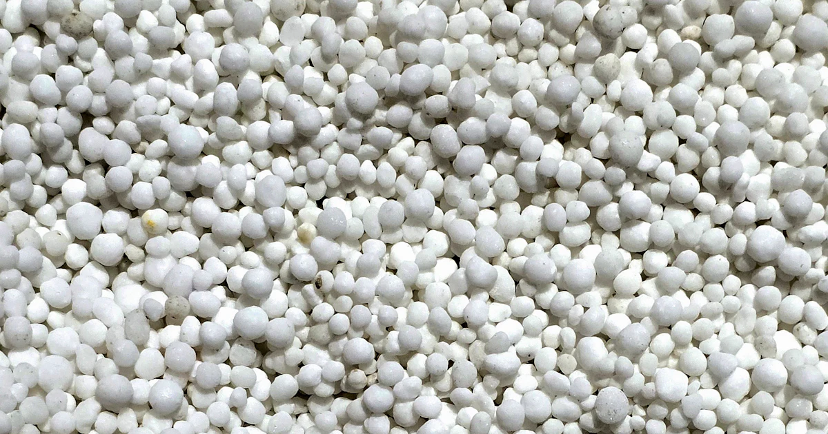 Close-up of white fertilizer granules